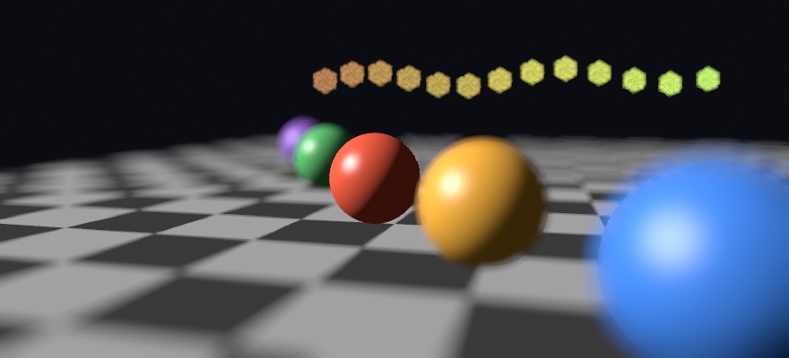 Five balls running back along a checkered floor with the lens focused on the red one in the middle: the red ball and the floor around it are sharp, the orange and blue balls in front of it are soft and the blue one spreads past its own edge, the green and violet ones behind it soften, and a row of small lights far behind opens into six-sided discs
