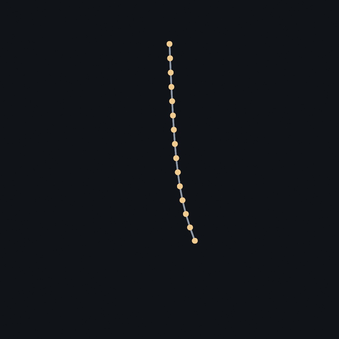 Fifteen pale yellow beads joined by a gray line hang from a point near the top of a dark canvas, almost straight down, the lowest few curving a little to the right
