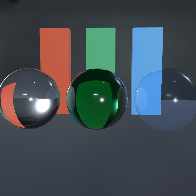 Three glass spheres in front of a red, a green, and a blue bar. The left sphere is clear solid glass and shows the red bar flipped and warped inside it. The middle sphere is deep bottle green with the green bar refracted inside. The right sphere is a thin pale-blue bubble and the blue bar passes through it almost unchanged